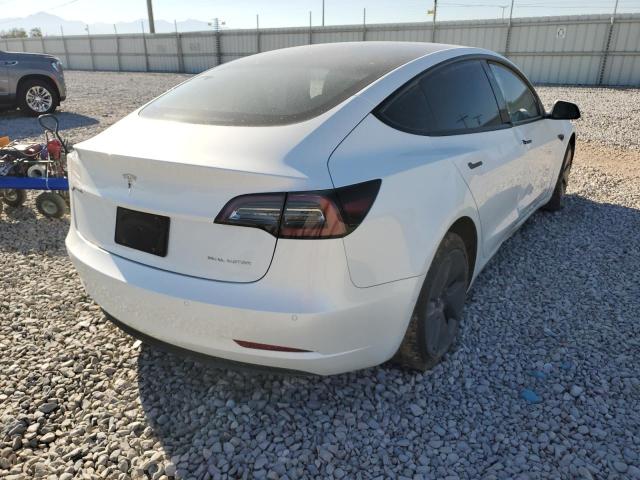 Photo 4 from auction – 2022 TESLA MODEL 3 with VIN 5YJ3E1EB0NF184377