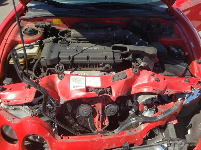 Photo 7 from auction – 2000 HYUNDAI TIBURON with VIN KMHJG25F1YU218358