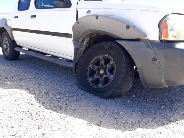 Photo 9 from auction – 2002 NISSAN FRONTIER C with VIN 1N6ED27T32C327741
