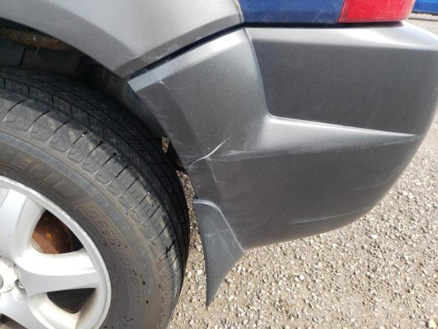 Photo 9 from auction – 2005 HYUNDAI TUCSON GL with VIN KM8JM72D65U094446