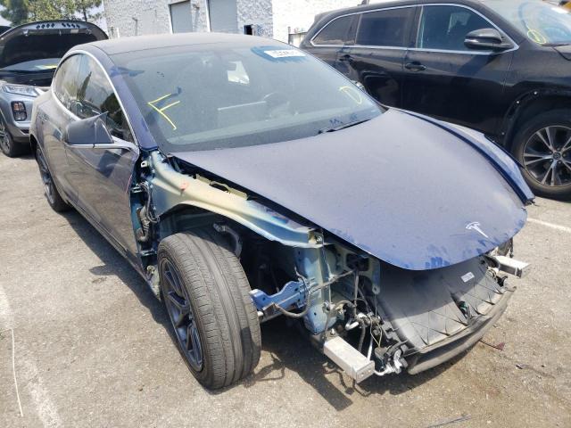 TESLA MODEL 3 2018 with VIN 5YJ3E1EAXJF189958 - Photo from auction