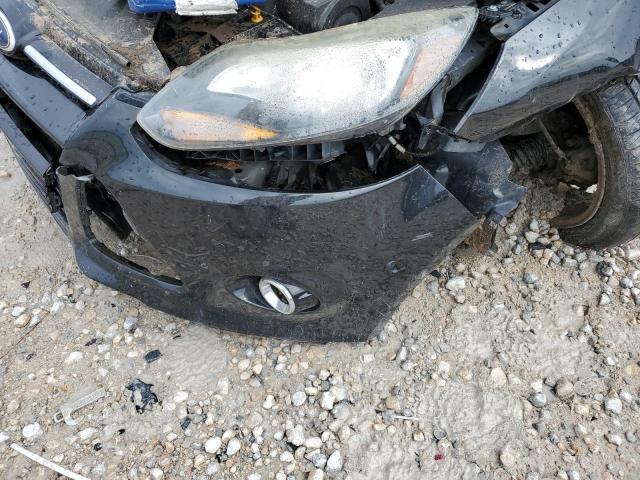 Photo 9 from auction – 2014 FORD FOCUS TITA with VIN 1FADP3J26EL193250