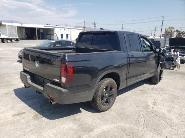 Photo 4 from auction – 2021 HONDA RIDGELINE with VIN 5FPYK3F80MB018573