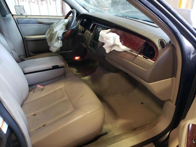 Photo 5 from auction – 2004 LINCOLN TOWN CAR U with VIN 1LNHM83W54Y639743