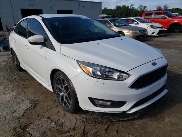 FORD FOCUS SE 2016 with VIN 1FADP3F29GL389811 - Photo from auction