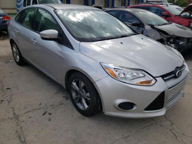 FORD FOCUS SE 2014 with VIN 1FADP3F20EL263317 - Photo from auction