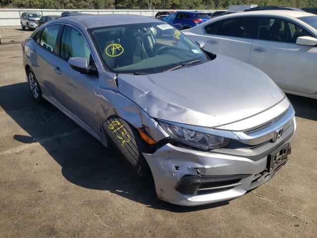HONDA CIVIC LX 2018 with VIN 2HGFC2F59JH605780 - Photo from auction