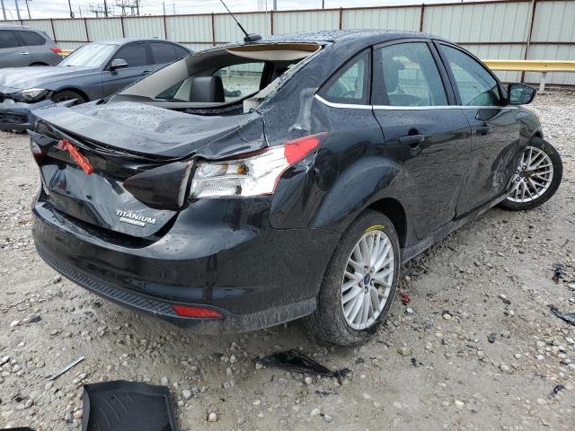 Photo 4 from auction – 2014 FORD FOCUS TITA with VIN 1FADP3J26EL193250