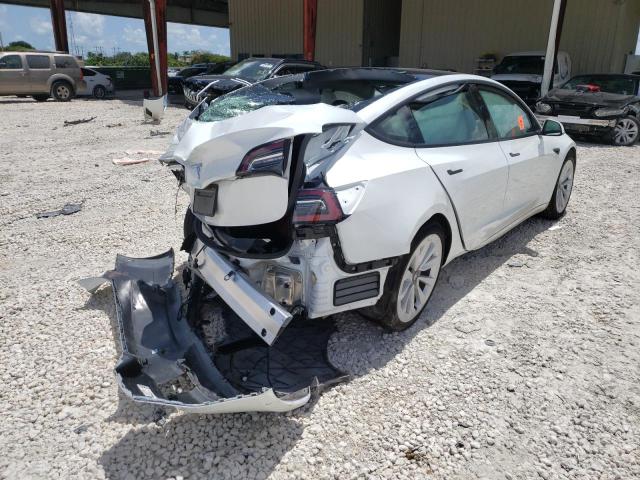 Photo 4 from auction – 2021 TESLA MODEL 3 with VIN 5YJ3E1EA5MF057775