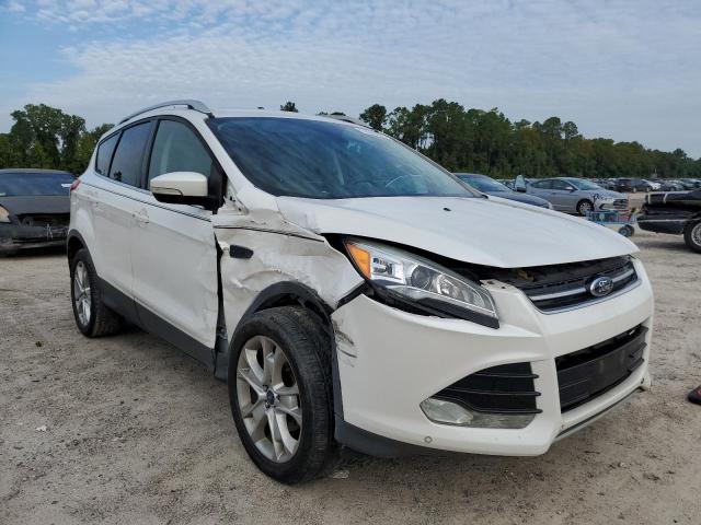 FORD ESCAPE TIT 2015 with VIN 1FMCU0JX1FUC03103 - Photo from auction