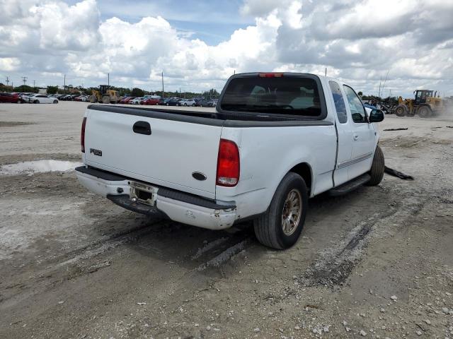 Photo 4 from auction – 2003 FORD F150 with VIN 1FTRX17223NA54911