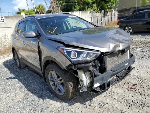 HYUNDAI SANTA FE S 2018 with VIN 5NMZU3LB5JH069231 - Photo from auction