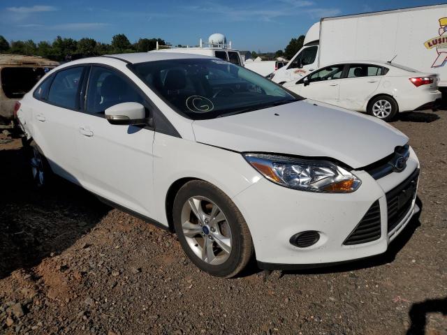 FORD FOCUS SE 2014 with VIN 1FADP3F21EL251077 - Photo from auction