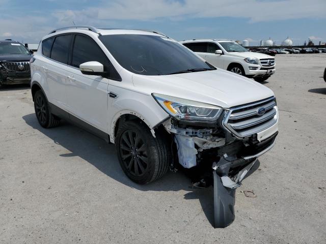 FORD ESCAPE TIT 2017 with VIN 1FMCU0J90HUA76266 - Photo from auction