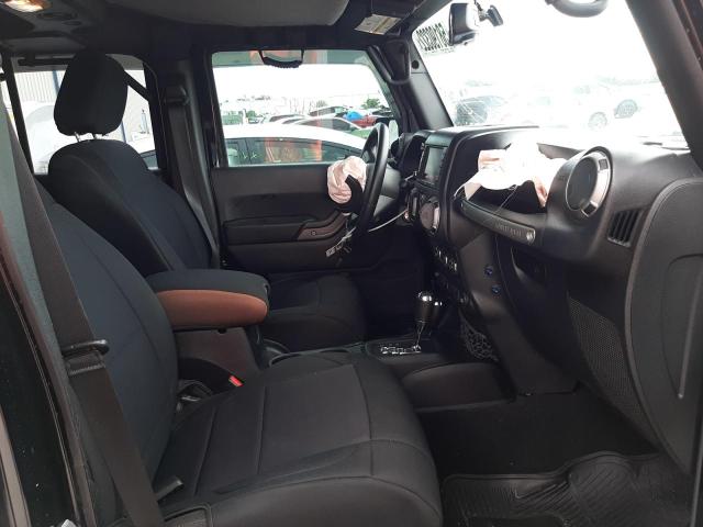 Photo 5 from auction – 2016 JEEP WRANGLER U with VIN 1C4BJWDG3GL123199