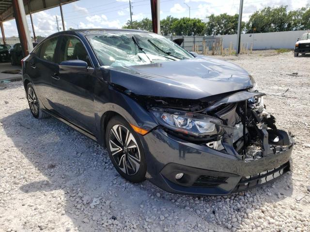 HONDA CIVIC EXL 2018 with VIN JHMFC1F76JX018215 - Photo from auction