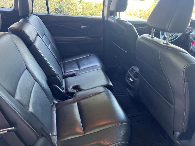 Photo 6 from auction – 2016 HONDA PILOT EXL with VIN 5FNYF5H54GB004479