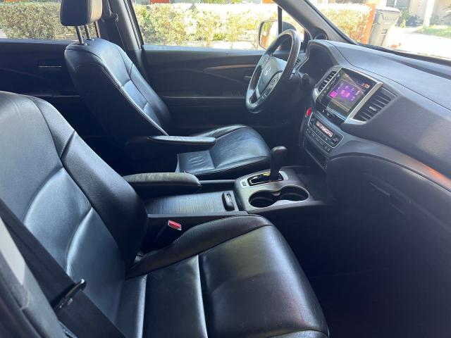 Photo 5 from auction – 2016 HONDA PILOT EXL with VIN 5FNYF5H54GB004479