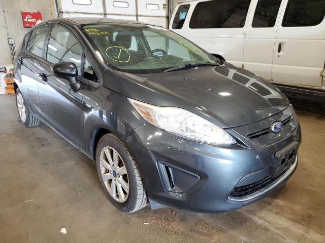 FORD FIESTA SE 2011 with VIN 3FADP4EJ9BM238117 - Photo from auction