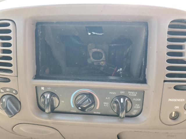 Photo 9 from auction – 2000 FORD F150 with VIN 1FTRX18L3YNC03440