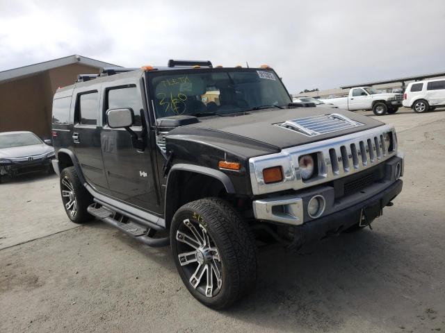 HUMMER H2 2004 with VIN 5GRGN23U04H111552 - Photo from auction