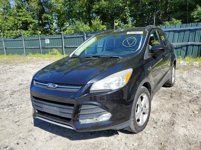 Photo 2 from auction – 2014 FORD ESCAPE SE with VIN 1FMCU0GX0EUB92620