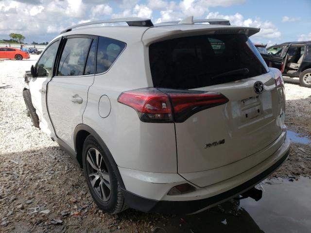Photo 3 from auction – 2017 TOYOTA RAV4 XLE with VIN JTMWFREV2HD095733