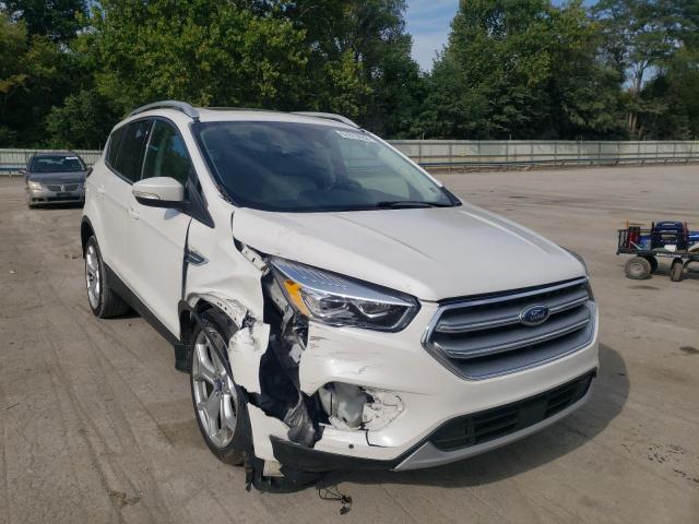 FORD ESCAPE TIT 2017 with VIN 1FMCU9J98HUE21600 - Photo from auction