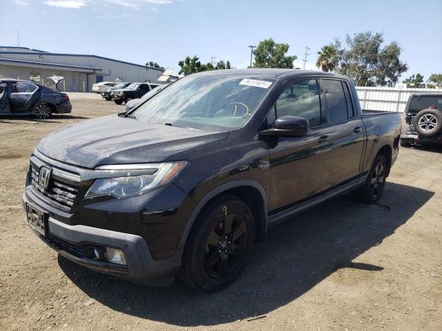 Photo 2 from auction – 2017 HONDA RIDGELINE with VIN 5FPYK3F84HB019344