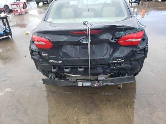 Photo 9 from auction – 2016 FORD FOCUS SE with VIN 1FADP3F20GL204965