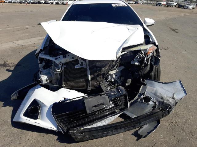 Photo 9 from auction – 2014 TOYOTA COROLLA L with VIN 5YFBURHEXEP075741