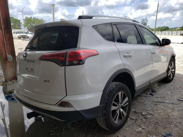 Photo 4 from auction – 2017 TOYOTA RAV4 XLE with VIN JTMWFREV2HD095733