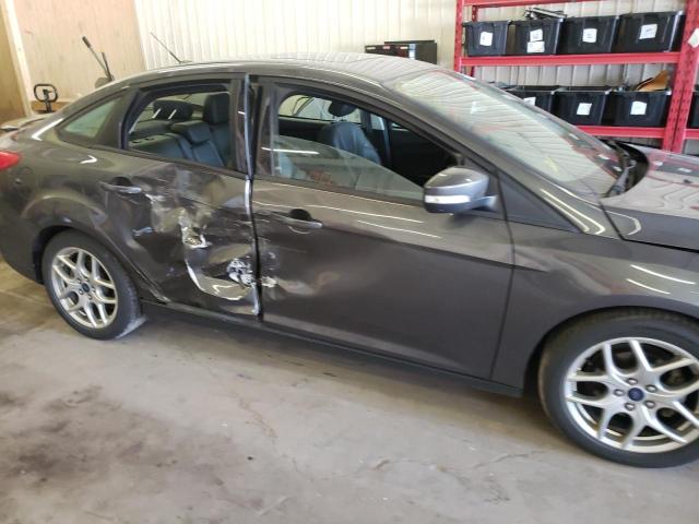 Photo 9 from auction – 2015 FORD FOCUS SE with VIN 1FADP3F23FL314312