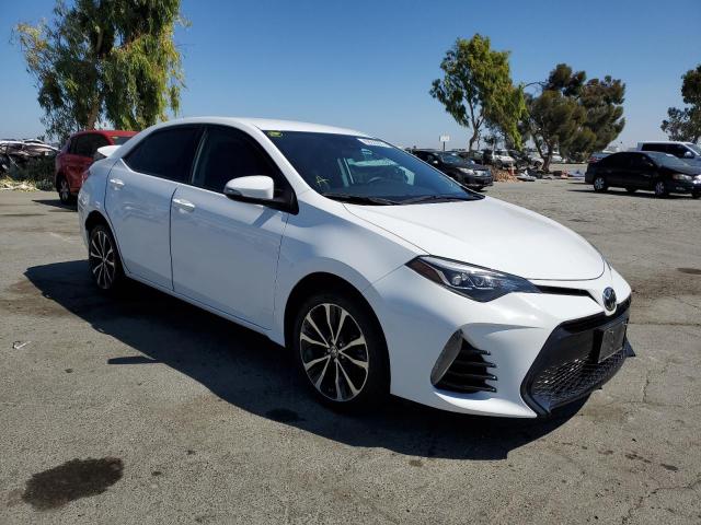 TOYOTA COROLLA L 2017 with VIN 5YFBURHE3HP675974 - Photo from auction