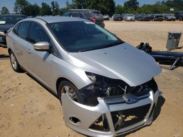 FORD FOCUS SE 2013 with VIN 1FADP3F21DL216702 - Photo from auction