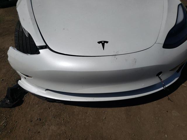 Photo 7 from auction – 2021 TESLA MODEL 3 with VIN 5YJ3E1EBXMF002277