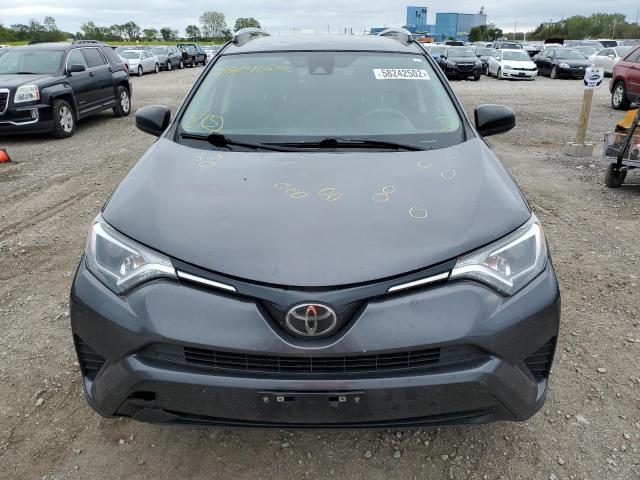 Photo 9 from auction – 2018 TOYOTA RAV4 LE with VIN JTMBFREV6JJ188616