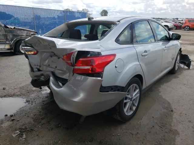 Photo 4 from auction – 2018 FORD FOCUS SE with VIN 1FADP3F20JL212510