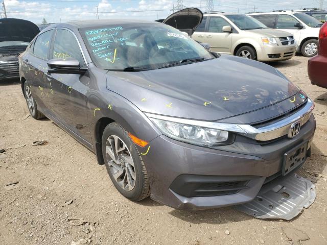 HONDA CIVIC EX 2018 with VIN 2HGFC2F7XJH593091 - Photo from auction
