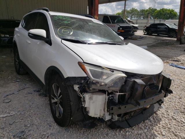Photo 1 from auction – 2017 TOYOTA RAV4 XLE with VIN JTMWFREV2HD095733
