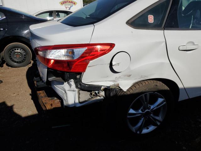 Photo 9 from auction – 2014 FORD FOCUS SE with VIN 1FADP3F21EL251077