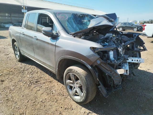 Photo 1 from auction – 2021 HONDA RIDGELINE with VIN 5FPYK3F5XMB020093