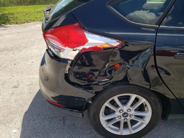 Photo 9 from auction – 2016 FORD FOCUS SE with VIN 1FADP3K25GL255559