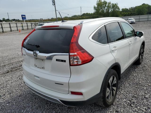 Photo 4 from auction – 2015 HONDA CR-V TOURI with VIN 5J6RM3H97FL026094