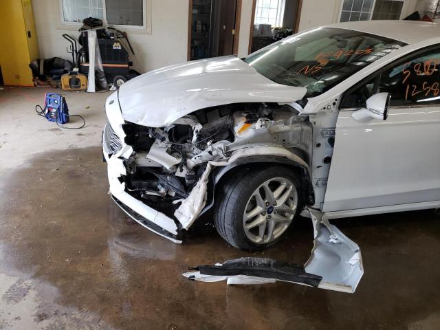 Photo 9 from auction – 2014 FORD FUSION with VIN 3FA6P0HD6ER109203
