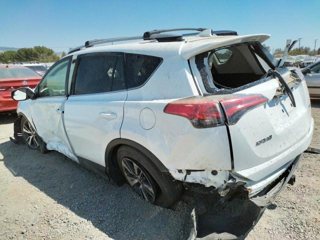 Photo 3 from auction – 2017 TOYOTA RAV4 XLE with VIN JTMWFREV1HD101926
