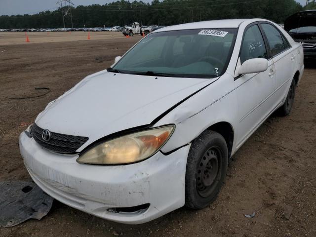 Photo 2 from auction – 2004 TOYOTA CAMRY LE with VIN JTDBE32K340267083