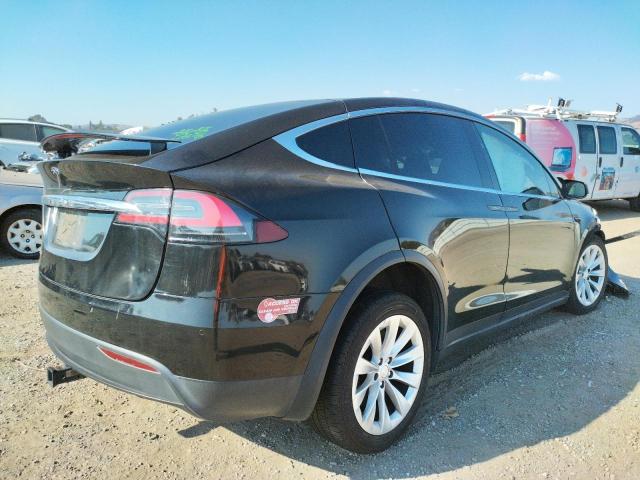 Photo 4 from auction – 2016 TESLA MODEL X with VIN 5YJXCAE21GF023661