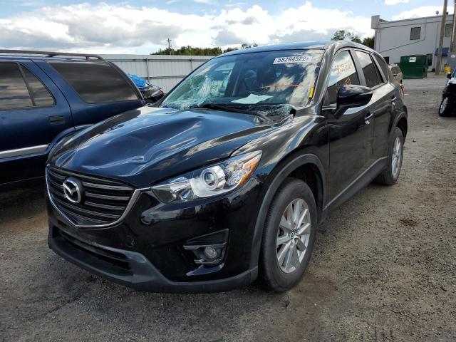 Photo 2 from auction – 2016 MAZDA CX-5 TOURI with VIN JM3KE4CY4G0851254