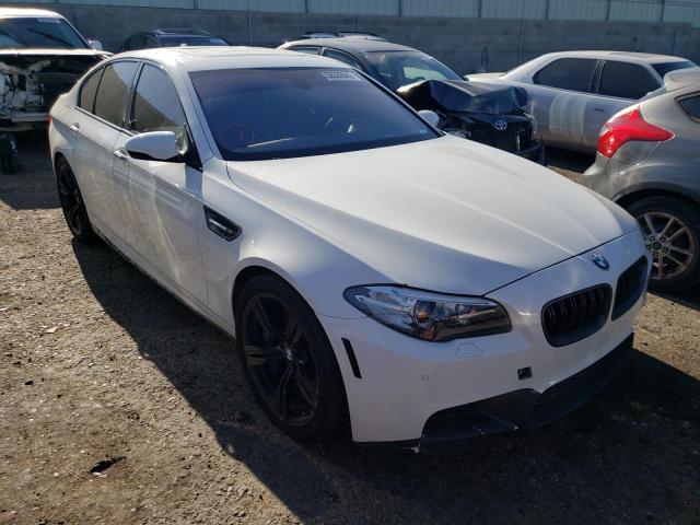 BMW M5 2014 with VIN WBSFV9C54ED097445 - Photo from auction